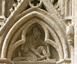 Panel 05:06 - Man with eagle's feet and beak, apparently flaying himself with a knife